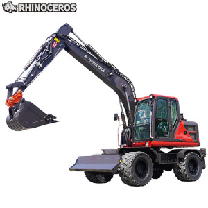 Máy xúc bánh lốp có kẹp gỗ
